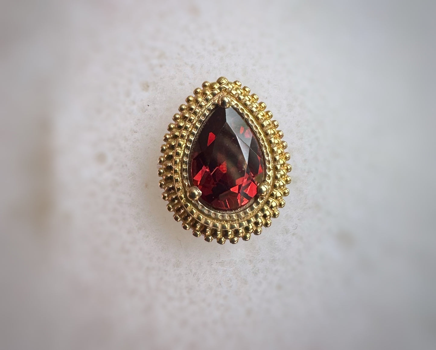 BVLA Garnet afghan pear yellow gold