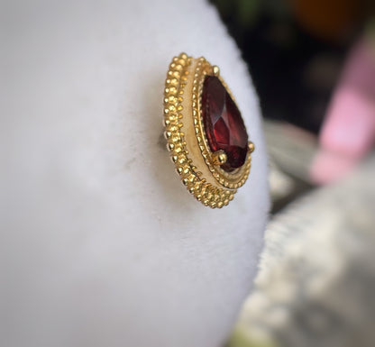 BVLA Garnet afghan pear yellow gold