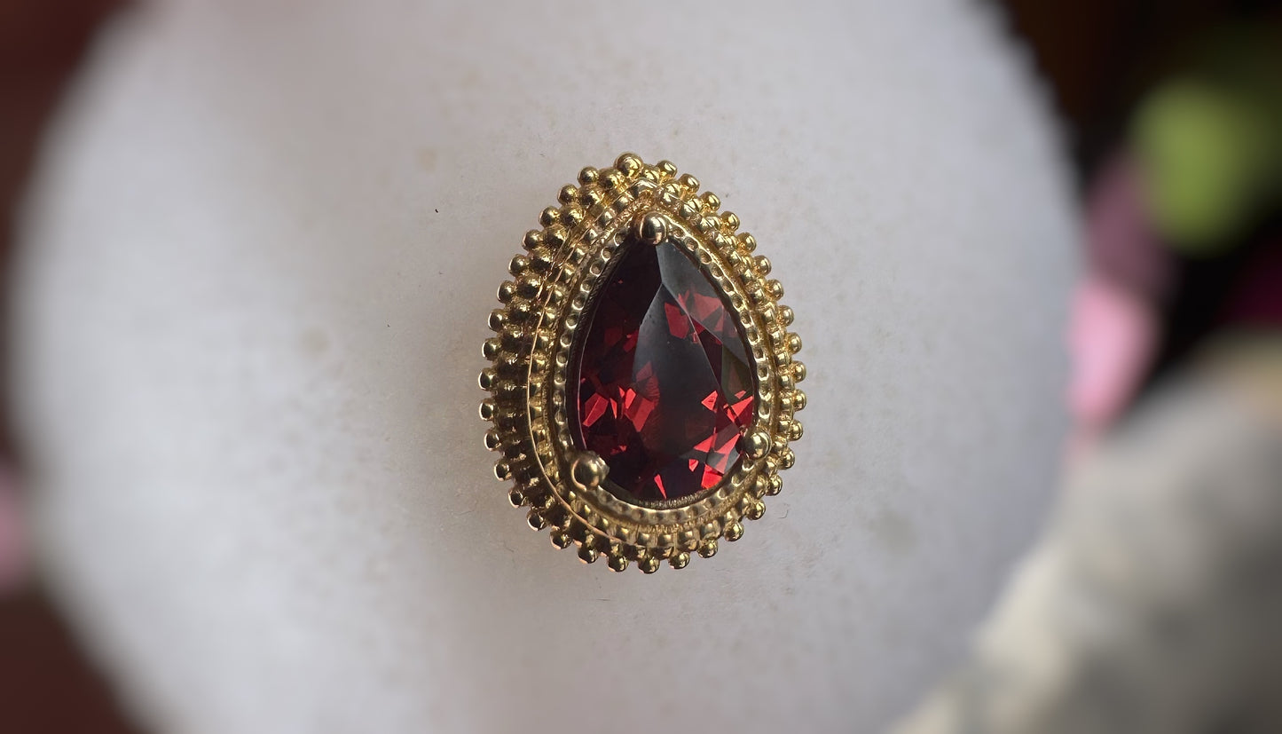 BVLA Garnet afghan pear yellow gold