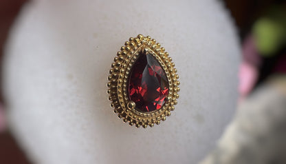 BVLA Garnet afghan pear yellow gold